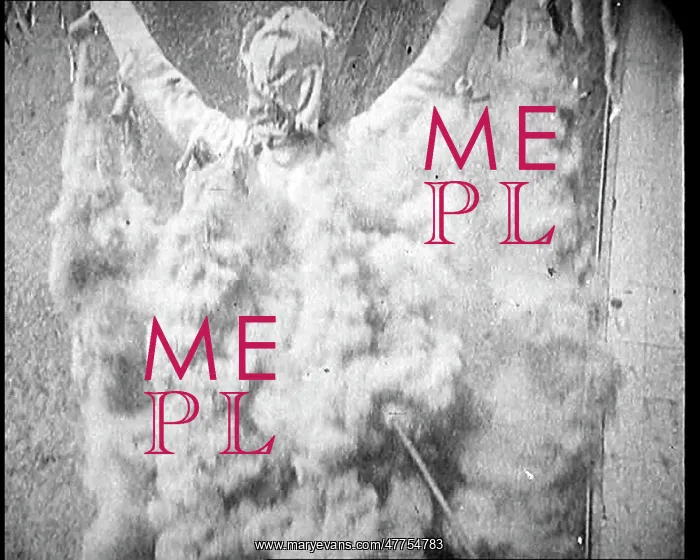 : A Man With Smoke Cannisters Pouring Out From : A Man With Smoke Cannisters Pouring Out From