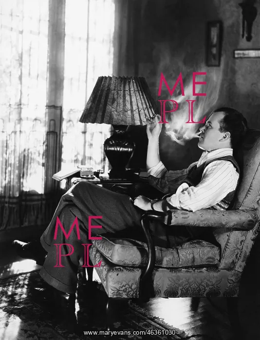 : Man smoking in living room : Man smoking in living room
