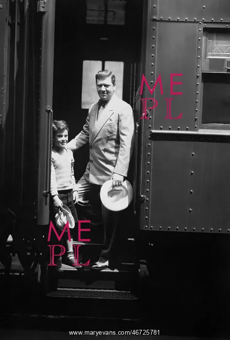 : Man and son on train : Man and son on train