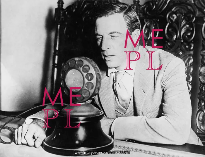 : Man speaking into a microphone : Man speaking into a microphone