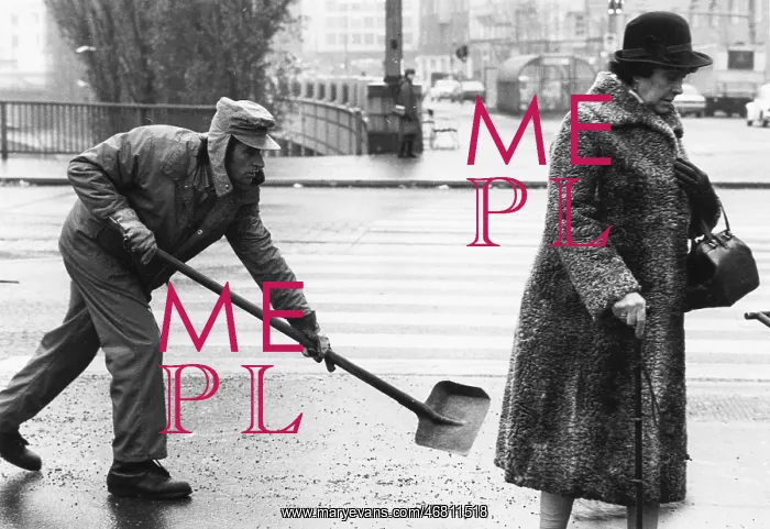 : Man sprinkles salt on a sidewalk 1983 : Man sprinkles salt on a sidewalk 1983