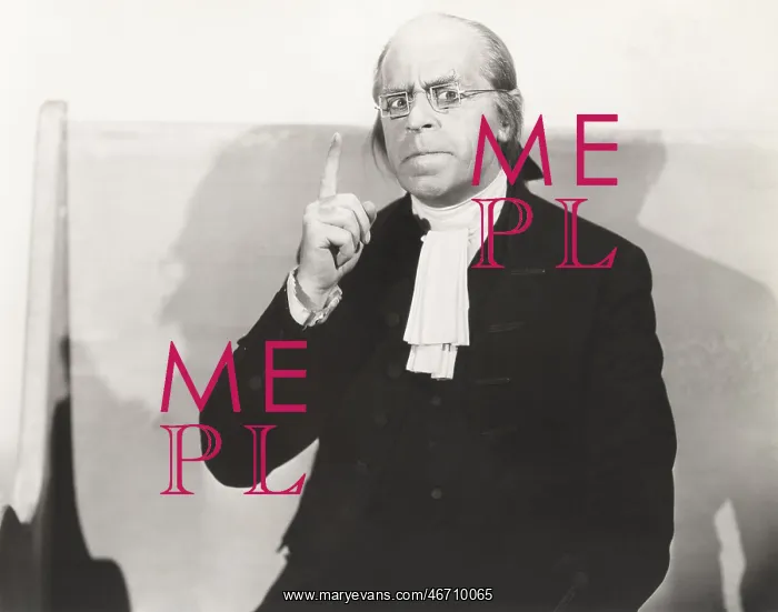 : Man in square wire rim glasses making a point : Man in square wire rim glasses making a point