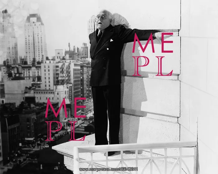 : Man standing on the ledge of a building and looking feared : Man standing on the ledge of a building and looking feared