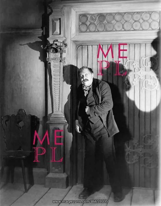 : Man standing in a room at night looking frightened : Man standing in a room at night looking frightened