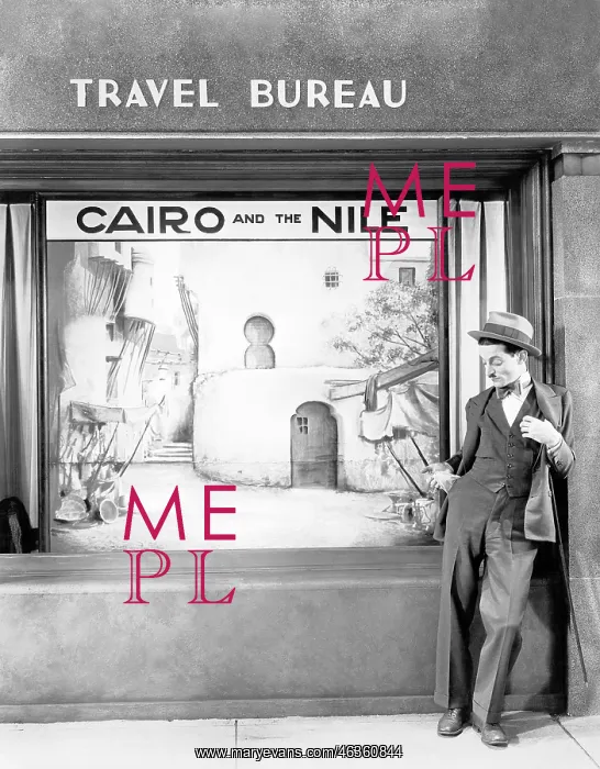 : Man standing in front of a store : Man standing in front of a store
