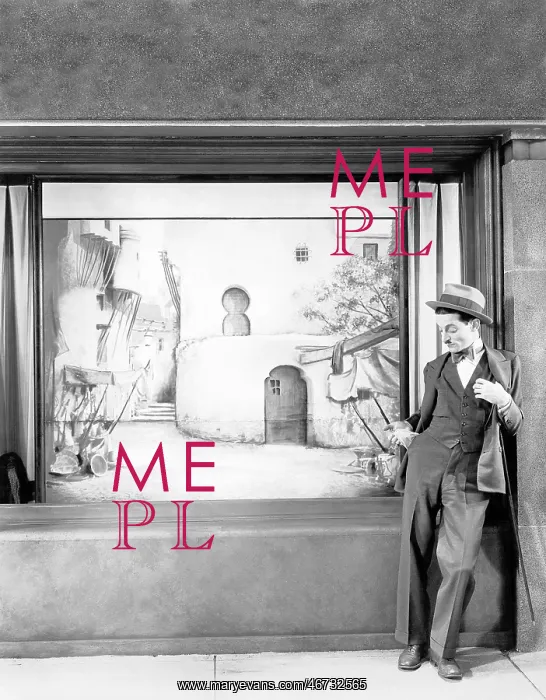 : Man standing in front of a store : Man standing in front of a store