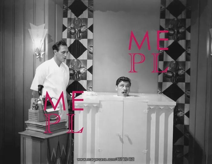 : Man in steam bath with assistant and dictaphone : Man in steam bath with assistant and dictaphone