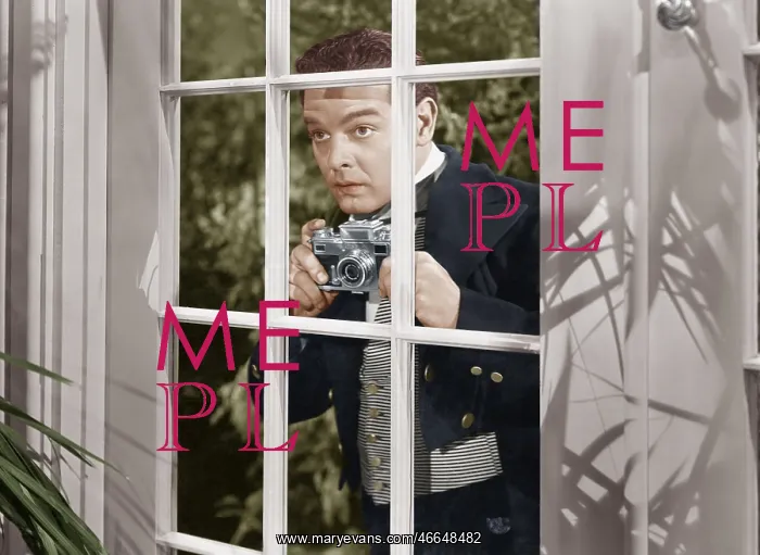 : Man taking pictures through window : Man taking pictures through window