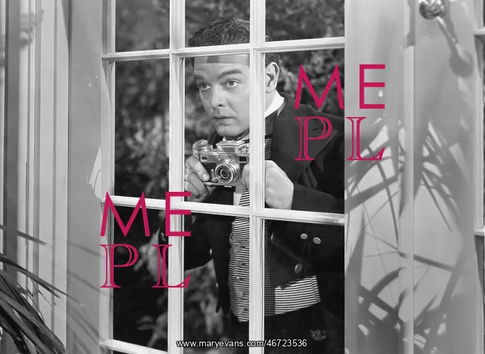 : Man taking pictures through window : Man taking pictures through window