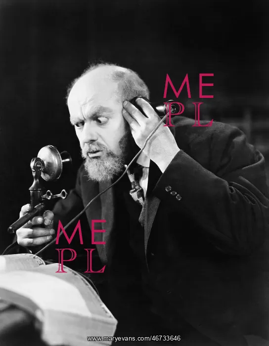 : Man talking on the telephone looking intense : Man talking on the telephone looking intense