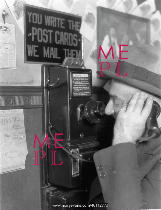 : A man telephoned in a Brauhaus. About : A man telephoned in a Brauhaus. About