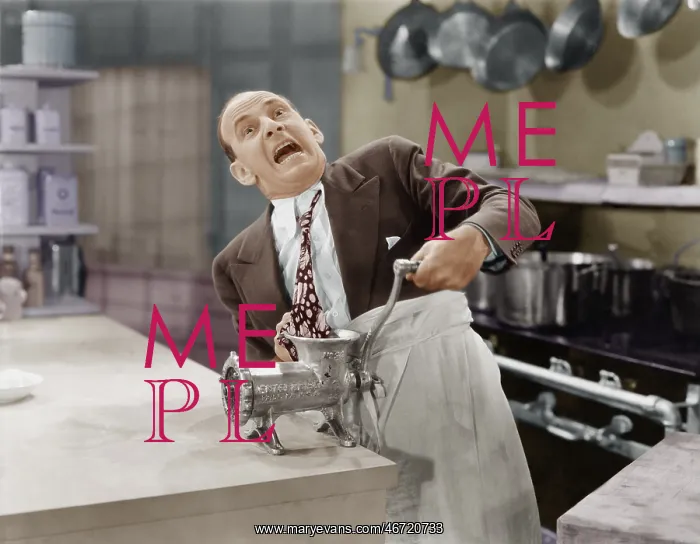: Man with tie stuck in meat grinder : Man with tie stuck in meat grinder