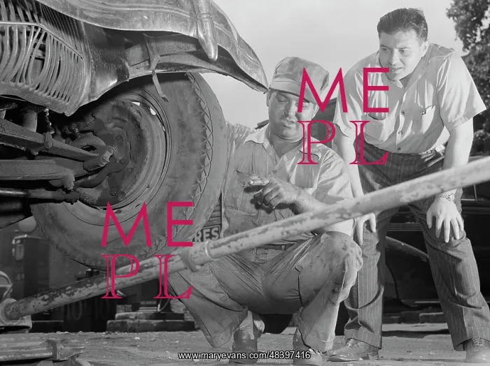 : A man has tires checked and adjusted to prevent : A man has tires checked and adjusted to prevent