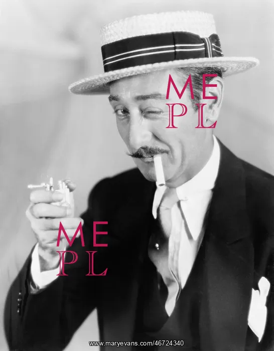 : Man trying to light a broken cigarette winking at : Man trying to light a broken cigarette winking at