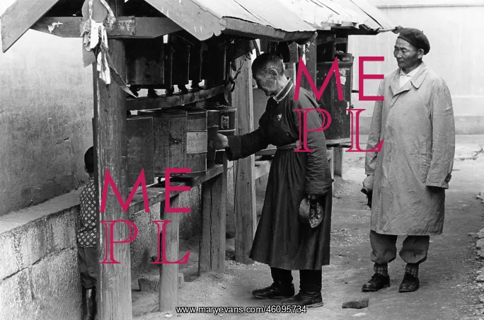 : Man turning prayer wheel, Gandan Monastery, Mongolia : Man turning prayer wheel, Gandan Monastery, Mongolia