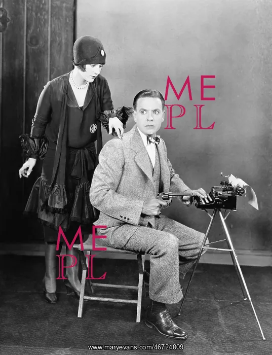 : Man at a typewriter holding a gun and a woman tapping : Man at a typewriter holding a gun and a woman tapping