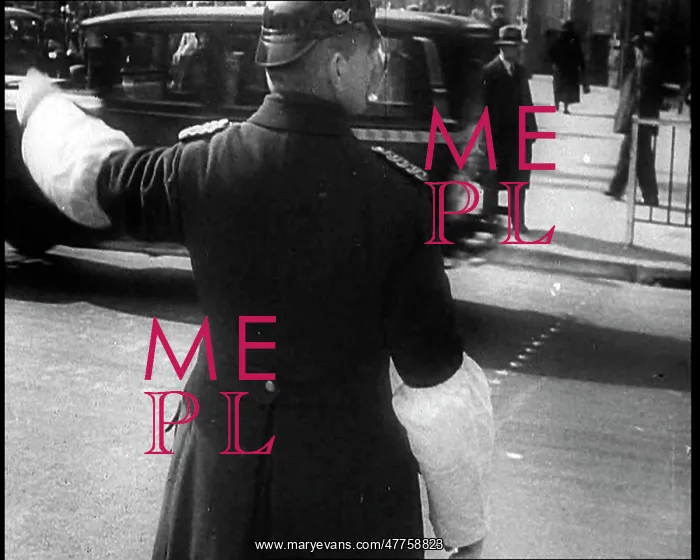 : Man in Uniform Guiding Traffic in Berlin, Germany : Man in Uniform Guiding Traffic in Berlin, Germany