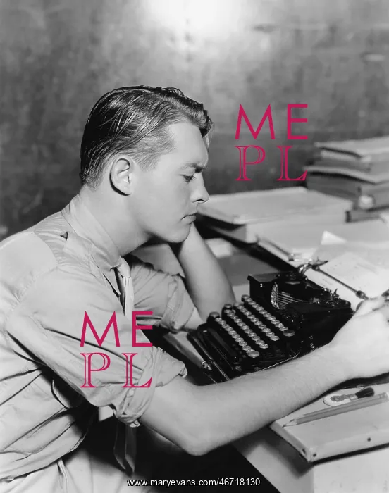 : Man using typewriter : Man using typewriter