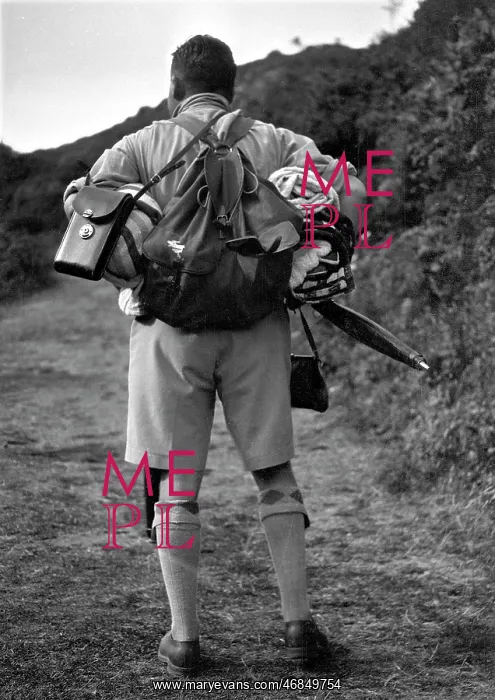 : Man out walking with backpack : Man out walking with backpack
