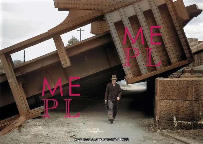 : Man walking under collapsed structure, WW2 : Man walking under collapsed structure, WW2