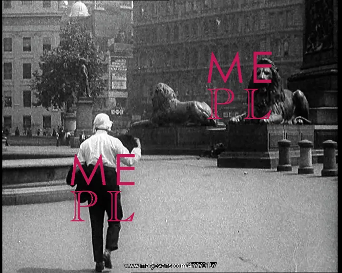 : A Man Walking Across Trafalgar Square, London : A Man Walking Across Trafalgar Square, London