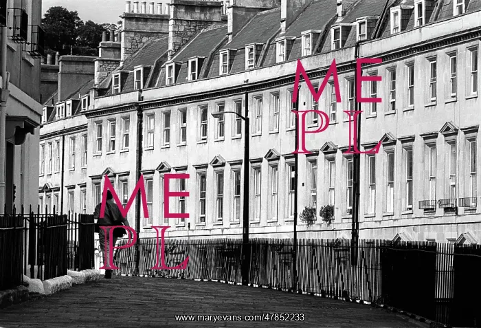 : A man walks briskly along The Paragon in the centre of Bath : A man walks briskly along The Paragon in the centre of Bath