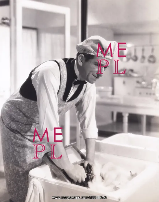 : Man washing clothes in the kitchen sink : Man washing clothes in the kitchen sink