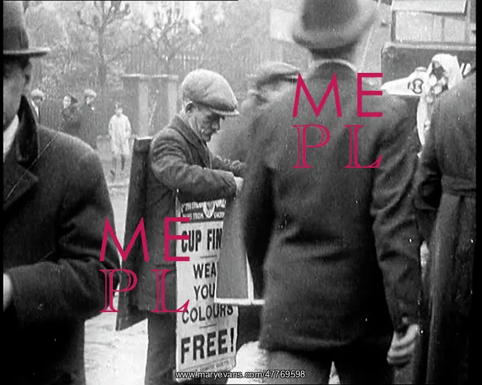 : A Man Wearing A Sandwich Board Advertising : A Man Wearing A Sandwich Board Advertising