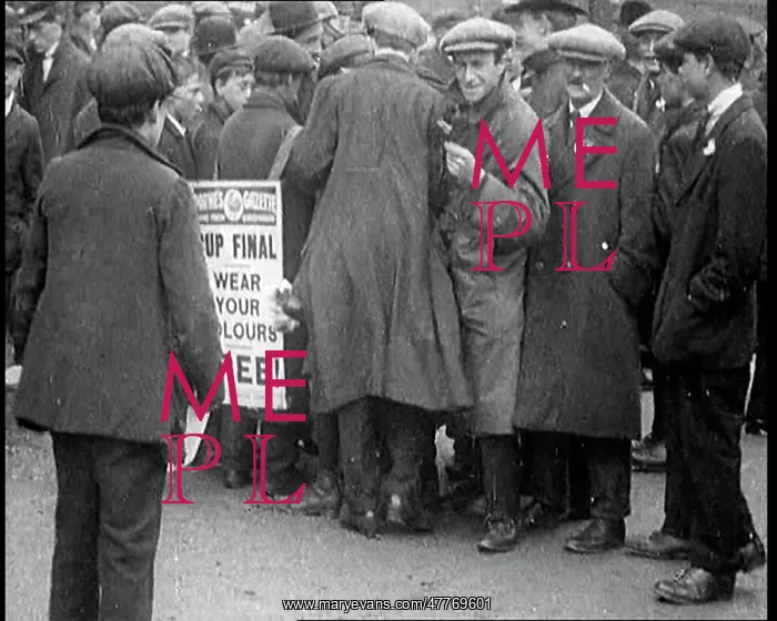 : A Man Wearing A Sandwich Board Advertising : A Man Wearing A Sandwich Board Advertising
