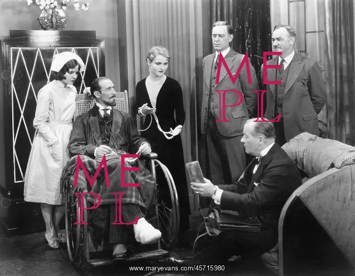 : Man in a wheel chair with a broken foot and a group : Man in a wheel chair with a broken foot and a group