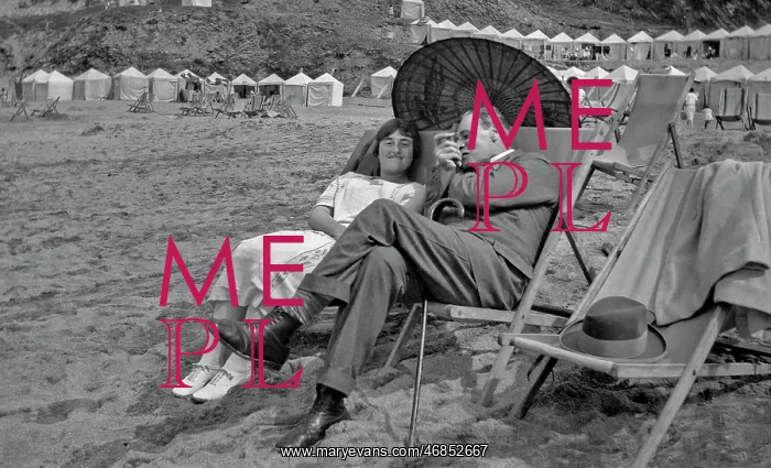 : Man and woman on the beach, Newquay, Cornwall : Man and woman on the beach, Newquay, Cornwall