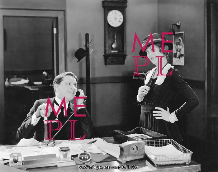 : Man and woman flirting in the office : Man and woman flirting in the office