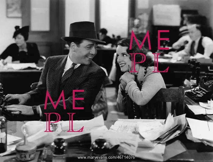 : Man and woman working in office : Man and woman working in office