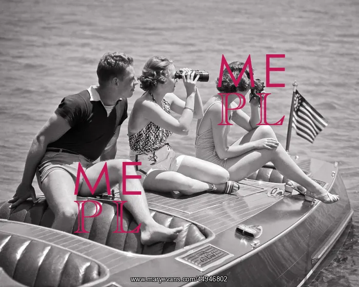 : Man and Two Women Sitting on Deck of Runabout : Man and Two Women Sitting on Deck of Runabout