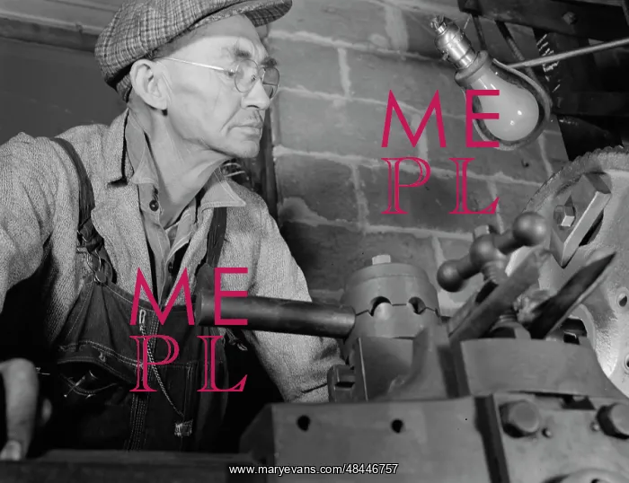 : Man working in a small machine shop for war : Man working in a small machine shop for war