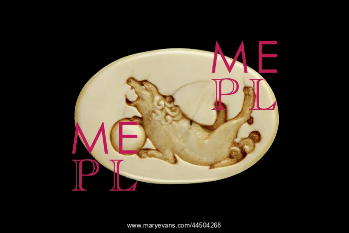  : Manju netsuke with a shishi playing with a ball
