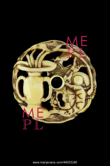 : Manju netsuke with silver shishi with ball : Manju netsuke with silver shishi with ball