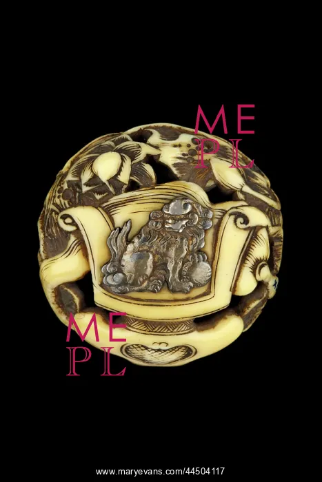 : Manju netsuke with silver shishi with ball : Manju netsuke with silver shishi with ball