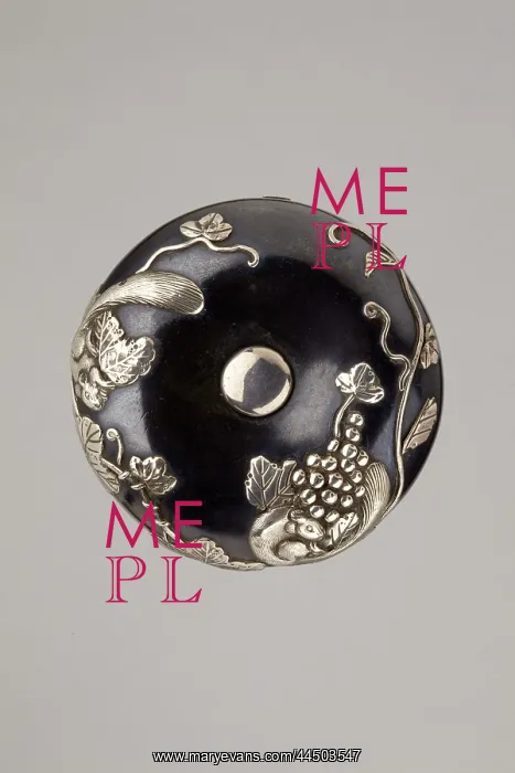 : Manju netsuke with squirrel and grape vine : Manju netsuke with squirrel and grape vine