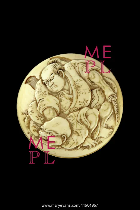 : Manju netsuke - a warrior slaying a bakemono : Manju netsuke - a warrior slaying a bakemono