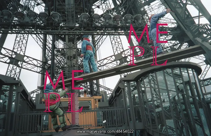 : Mannequins of renovator workers on Eiffel Tower : Mannequins of renovator workers on Eiffel Tower