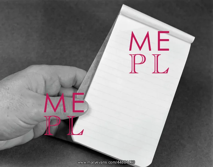 : Mans Hand Holding Small Note Pad : Mans Hand Holding Small Note Pad