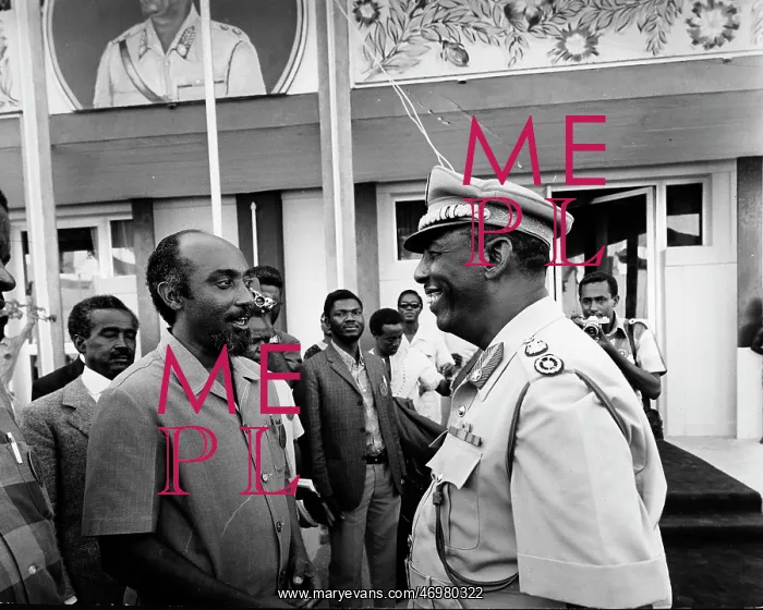 : Marcelino dos Santos talking to an officer : Marcelino dos Santos talking to an officer