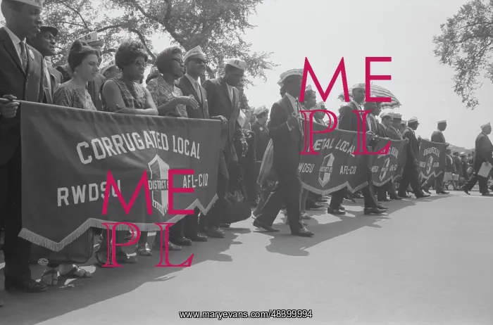 : Marchers carrying labor union banners during : Marchers carrying labor union banners during
