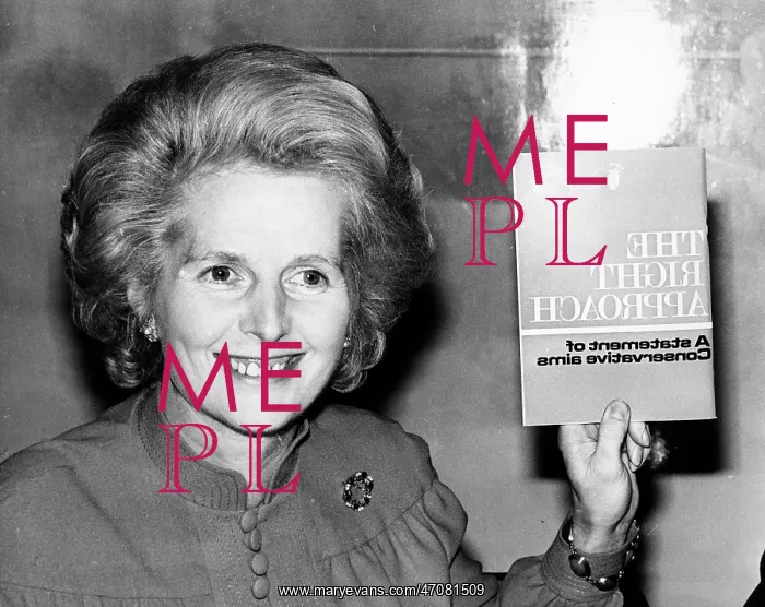 : Margaret Thatcher holding up a book : Margaret Thatcher holding up a book