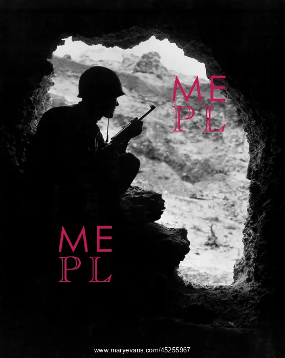 : Marine rifleman positioned in an cave to pick : Marine rifleman positioned in an cave to pick