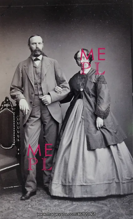 : Married couple. He with a long mustache and : Married couple. He with a long mustache and