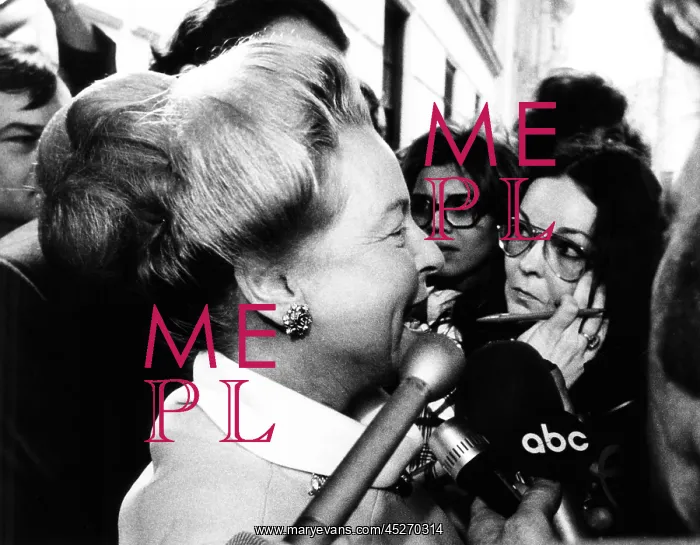 : Martha Mitchell talks to the press outside her : Martha Mitchell talks to the press outside her