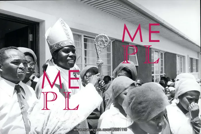 : After Mass, outside in the hot African sun : After Mass, outside in the hot African sun