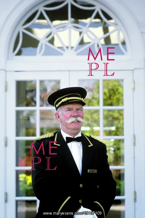 : Mature Man Doorman in Uniform Wearing Hat White : Mature Man Doorman in Uniform Wearing Hat White